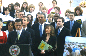 Los Angeles Mayor Antonio Villaraigosa addresses the press conference on the city’s new Darfur Divestment initiative as members of the Los Angeles City Council look on.